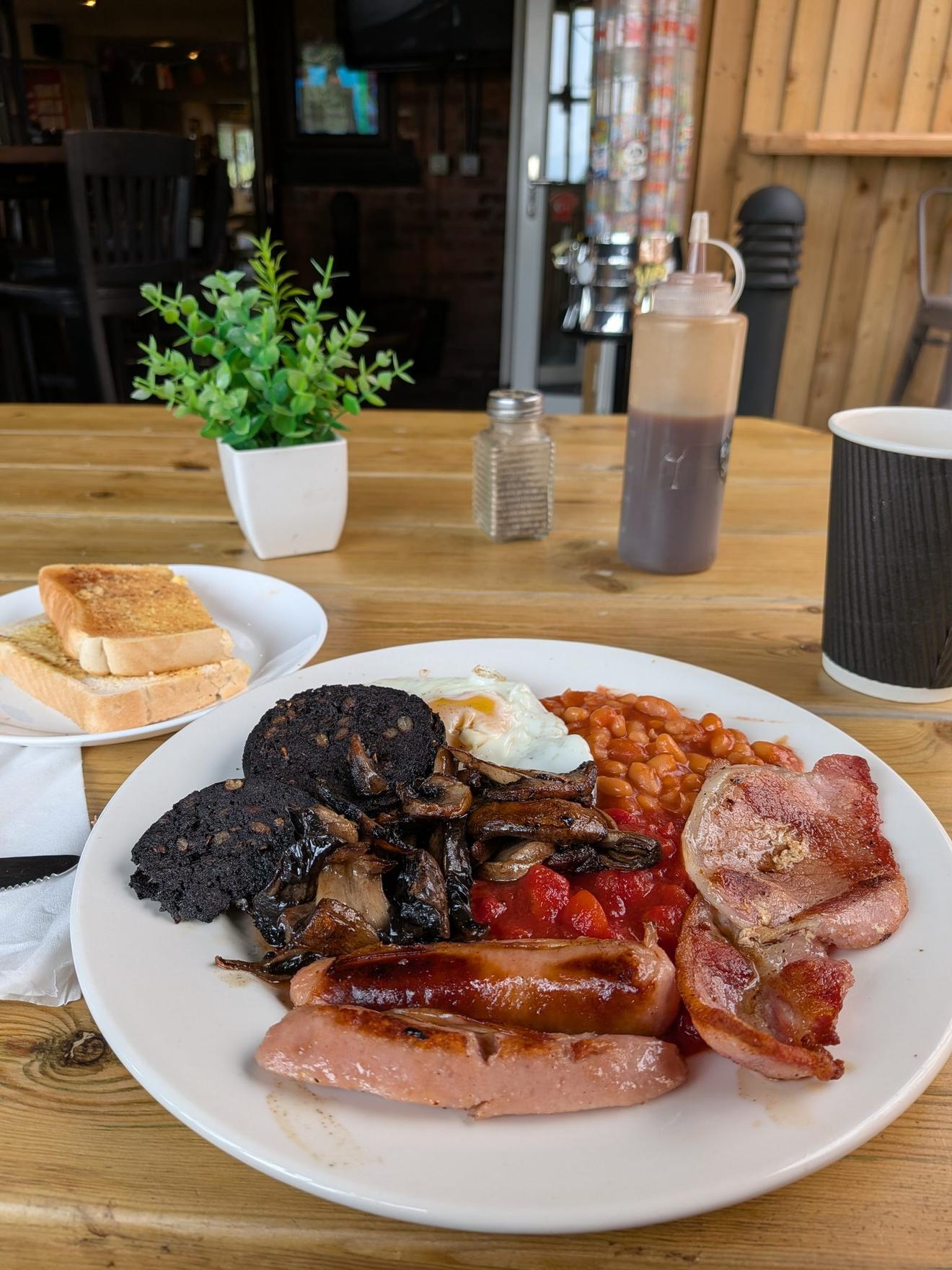A full English breakfast at the Old Star: sausages, bacon, black pudding, beans, fried egg, mushrooms, tomato and toast