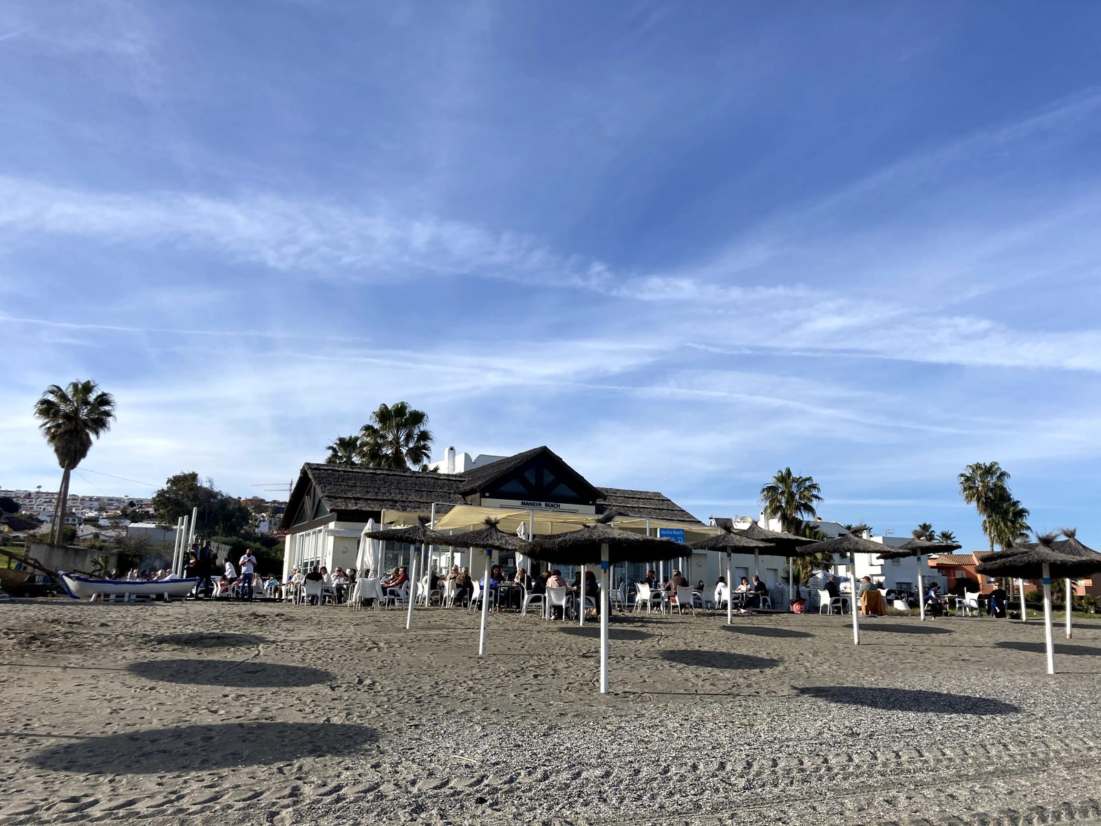 The Friday fish-boat bar, ten minutes up the sand.